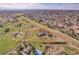 Expansive aerial view showcasing the property with large lot and beautiful surrounding landscape and neighborhood at 6360 S Gibraltar Cir, Centennial, CO 80016