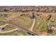 Expansive aerial view showcasing the property with large lot and beautiful surrounding landscape and neighborhood at 6360 S Gibraltar Cir, Centennial, CO 80016