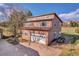 Exterior shot of the garage showcasing traditional architecture at 6360 S Gibraltar Cir, Centennial, CO 80016