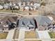 Aerial view showcases the home's location near a park with playground and the surrounding neighborhood at 20795 Scenic Park Dr, Parker, CO 80138