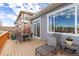 Relaxing back deck featuring outdoor seating, a dining area, and plenty of space at 20795 Scenic Park Dr, Parker, CO 80138