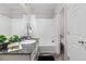 Bright bathroom showcasing a large vanity, shower with tub, and modern design at 20795 Scenic Park Dr, Parker, CO 80138