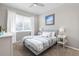 Neutral bedroom showcasing a large window, carpet, and lots of natural light at 20795 Scenic Park Dr, Parker, CO 80138
