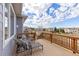 Relaxing deck with lounge chairs and a view of the neighborhood at 20795 Scenic Park Dr, Parker, CO 80138