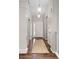 Bright entryway with wood floors, stylish lighting, and neutral paint, creating a welcoming ambiance at 20795 Scenic Park Dr, Parker, CO 80138