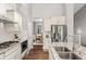Spacious kitchen featuring stainless steel appliances, granite counters, and hardwood floors at 20795 Scenic Park Dr, Parker, CO 80138