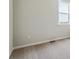 Bedroom featuring neutral carpet, white walls, and a window to let in natural light at 14366 Heritage Dr, Mead, CO 80504