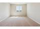 Bedroom with neutral carpet and a window at 14366 Heritage Dr, Mead, CO 80504