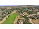 Aerial shot of the neighborhood showing homes and golf course at 5904 Meadowbrook Dr, Morrison, CO 80465
