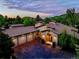 Stunning home featuring a terracotta-colored roof, attached garage, and well-manicured front yard, perfect for luxurious living at 5904 Meadowbrook Dr, Morrison, CO 80465