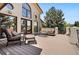Inviting outdoor patio with comfortable seating and a peaceful ambiance, ideal for enjoying the outdoors at 5904 Meadowbrook Dr, Morrison, CO 80465