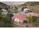 Beautiful aerial view of homes nestled among rolling hills at 6321 Spotted Fawn Run, Littleton, CO 80125