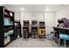 Finished basement featuring arcade games and seating at 6321 Spotted Fawn Run, Littleton, CO 80125