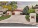 Charming single-story home with a three-car garage and well-maintained landscaping at 6321 Spotted Fawn Run, Littleton, CO 80125