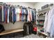 Walk-in closet with ample storage for clothes and accessories at 6321 Spotted Fawn Run, Littleton, CO 80125