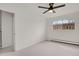 An airy bedroom with a door, window and carpet at 1149 Columbine St # 202, Denver, CO 80206