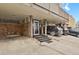 Building entrance featuring stone accents, covered parking, and a welcoming entry for residents and guests at 1149 Columbine St # 202, Denver, CO 80206