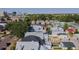 An aerial view of the neighborhood highlights the various rooftop styles and landscaping at 3018 Arapahoe St, Denver, CO 80205