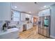 Well-equipped kitchen featuring stainless steel appliances and plenty of storage at 3018 Arapahoe St, Denver, CO 80205