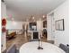 Open-concept space features a combined dining area and living area with sleek countertops and decor at 24197 E Ada Ave, Aurora, CO 80018