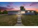 Charming single-story home with front yard and walkway to the front door at 6924 S Albion St, Centennial, CO 80122