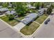 A charming single-story home with a well-manicured lawn, long driveway, and a single car garage at 6924 S Albion St, Centennial, CO 80122