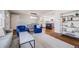Open-concept living area connecting the living room and kitchen provides a seamless flow for modern living at 6924 S Albion St, Centennial, CO 80122