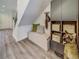Functional entryway area with storage, bench seating, and stylish decor elements at 10346 Uvalda Ave, Commerce City, CO 80022