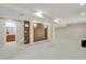 Spacious open basement with neutral carpet and paint at 5521 S Yakima St, Aurora, CO 80015
