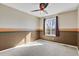 A well-lit room featuring two-tone walls and a bright window view at 5521 S Yakima St, Aurora, CO 80015