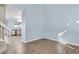 Open entryway with hardwood floors, stairs to the upper level, and access to the kitchen at 5521 S Yakima St, Aurora, CO 80015