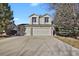 Charming two-story home features a three car garage and a spacious concrete driveway at 5521 S Yakima St, Aurora, CO 80015