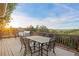 Relaxing outdoor deck with seating and expansive mountain views under a sunny sky at 3850 Hopi Dr, Sedalia, CO 80135