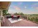 Outdoor deck with table and seating providing unobstructed views of the landscape at 3850 Hopi Dr, Sedalia, CO 80135