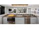 Beautiful kitchen featuring stainless steel appliances, modern countertops, and an undermount sink at 3850 Hopi Dr, Sedalia, CO 80135