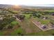 Sprawling land showcases an equestrian facility, including paddocks, fields, and a barn, highlighting the property's countryside allure at 3850 Hopi Dr, Sedalia, CO 80135