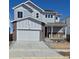 Charming two-story home with a covered front porch and a two car garage at 1231 Loraine N Cir, Lafayette, CO 80026