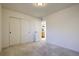 Bright bedroom with carpeted floors and closet space at 16357 E 111Th Pl, Commerce City, CO 80022