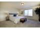 Comfortable bedroom with decorative furnishings, a window, and wall art at 16357 E 111Th Pl, Commerce City, CO 80022