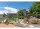 Charming backyard with a deck, garden, and pathway at 11100 Yarrow St, Broomfield, CO 80021