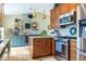 Well-equipped kitchen with an island and decorative backsplash at 11100 Yarrow St, Broomfield, CO 80021