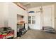 Well-organized garage featuring ample storage cabinets and a clean, finished floor at 141 Back Nine Dr, Castle Pines, CO 80108