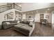 Open floor plan connecting the living room, kitchen, and dining area, great for entertaining at 141 Back Nine Dr, Castle Pines, CO 80108