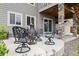 Cozy outdoor patio area with fire pit and comfortable seating for relaxing evenings at 141 Back Nine Dr, Castle Pines, CO 80108