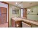 Bright bathroom with updated vanity and fixtures at 10553 W 84Th Pl, Arvada, CO 80005