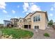 The backyard features a small deck, green lawn and low maintenance gravel landscaping at 17956 Gypsum Canyon Ct, Monument, CO 80132