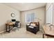 Office space featuring desk and a chair, as well as a window and an armchair at 17956 Gypsum Canyon Ct, Monument, CO 80132