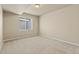 Bright and spacious room with neutral tones and ample natural light from a window at 17956 Gypsum Canyon Ct, Monument, CO 80132