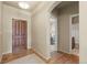 Inviting entryway featuring hardwood floors leading to the living areas at 17956 Gypsum Canyon Ct, Monument, CO 80132