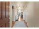 Welcoming entryway featuring hardwood floors and stylish lighting at 17956 Gypsum Canyon Ct, Monument, CO 80132